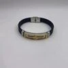 Bracelet Caoutchouc Et Une Plaque Bicolore Avec Aigle